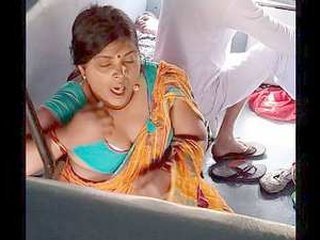 Busty Indian BBW shows off her assets on the train