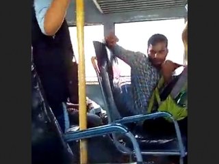 A Tarka man pleasures himself on a bus while aware of a female passenger filming him