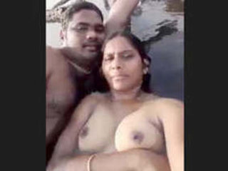 Indian couple enjoys each other's company at the beach