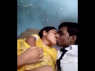 Desi lovers indulge in steamy smooching with their breasts pressed together
