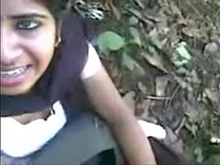 Tamil schoolgirl gives a blowjob in the forest and gets a facial