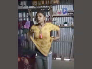 Tamil girl changes into traditional attire in village