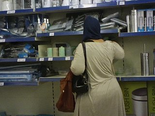 Arabian woman's large buttocks captured on camera