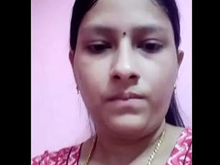 Desi bhabi flaunts her huge breasts in front of the camera