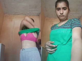 A stunning Indian girl proudly displays her bare body in a sizzling video