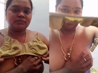 Tamil bhabhi teases and talks in a steamy show